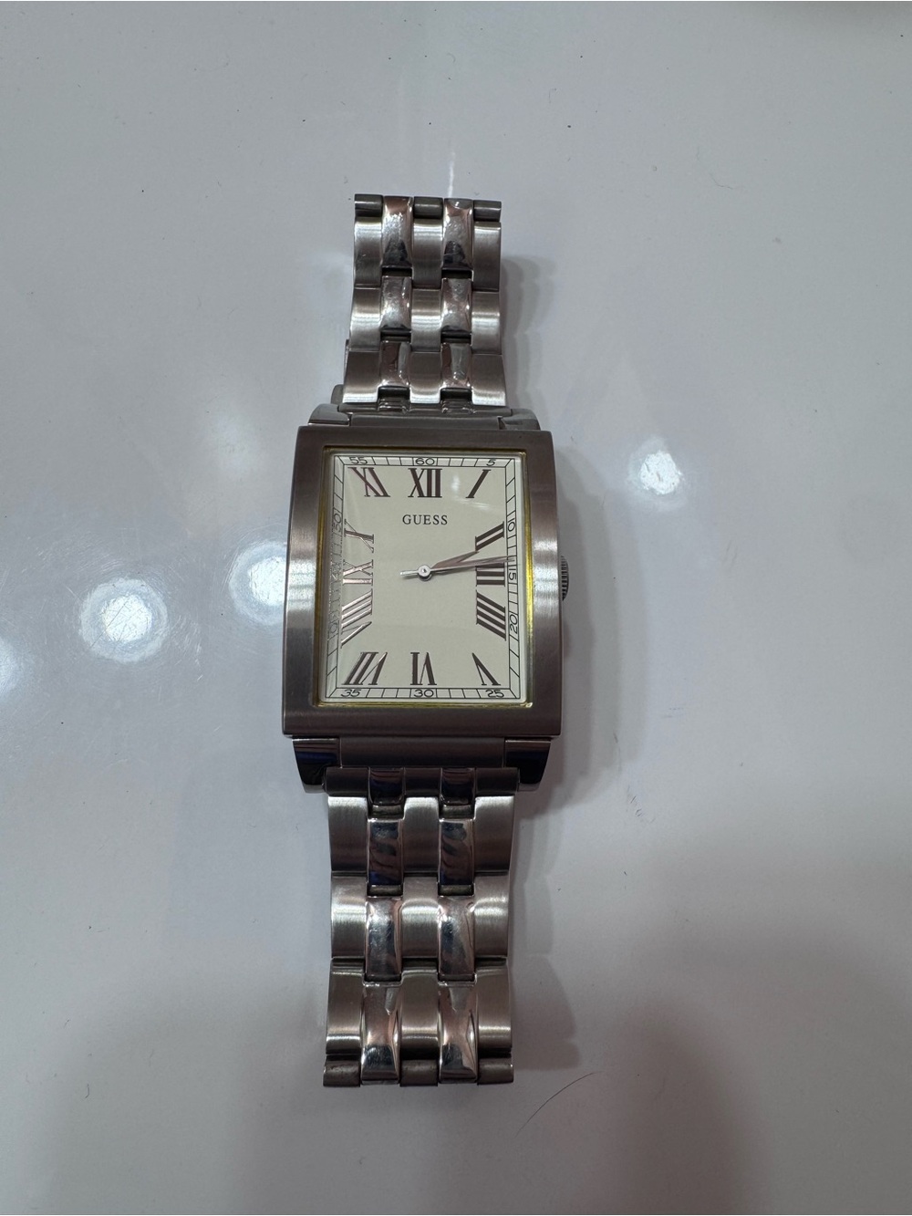 GUESS Men’s Silver Rectangular Stainless Steel Roman Numeral Watch W85062G2